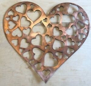 Hearts within heart wall metal art with rustic copper