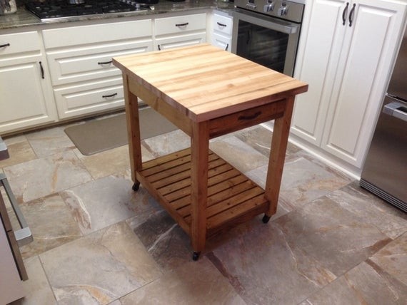 Items similar to small kitchen island with cutting board