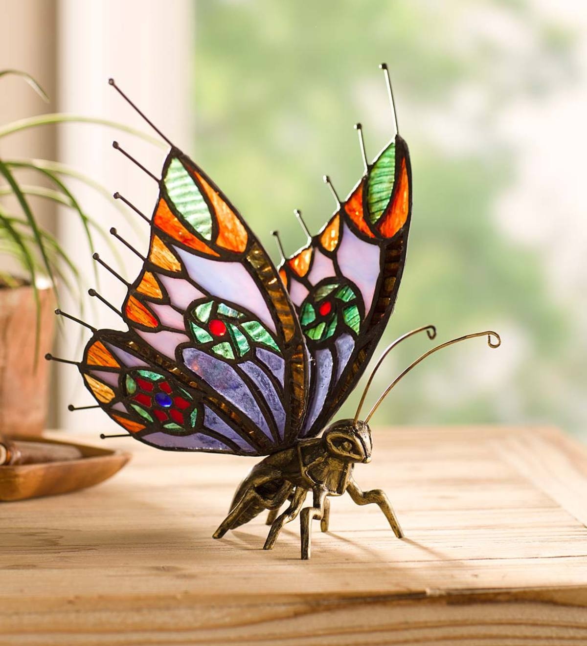 Metal and stained glass butterfly wind and weather