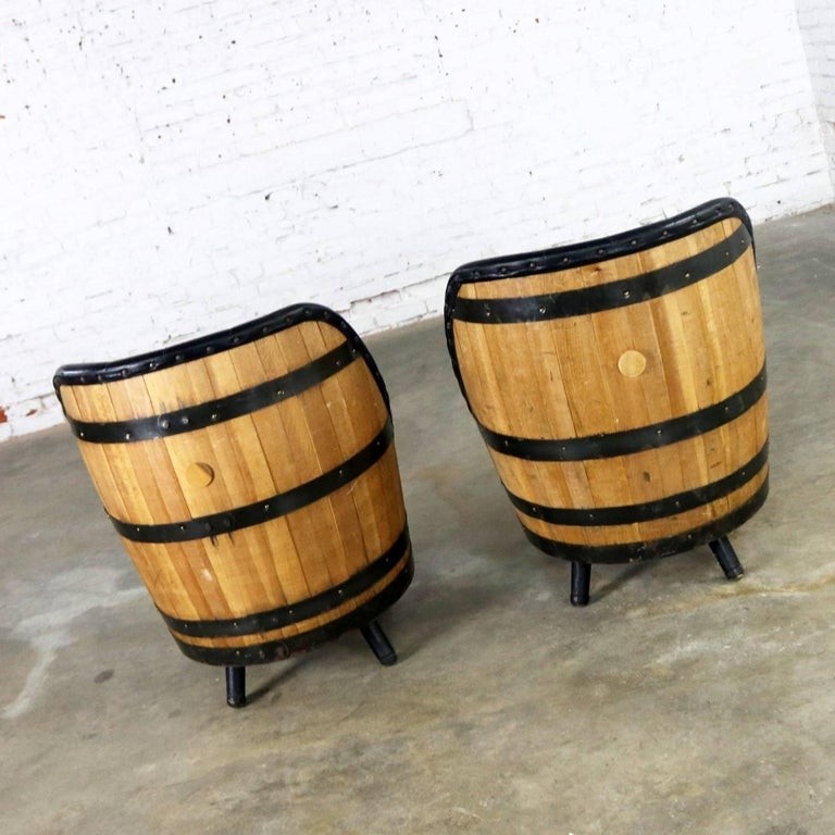 Midcentury whiskey barrel swivel barrel chairs by brothers 1