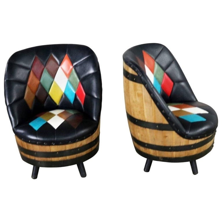 Midcentury whiskey barrel swivel barrel chairs by brothers 2