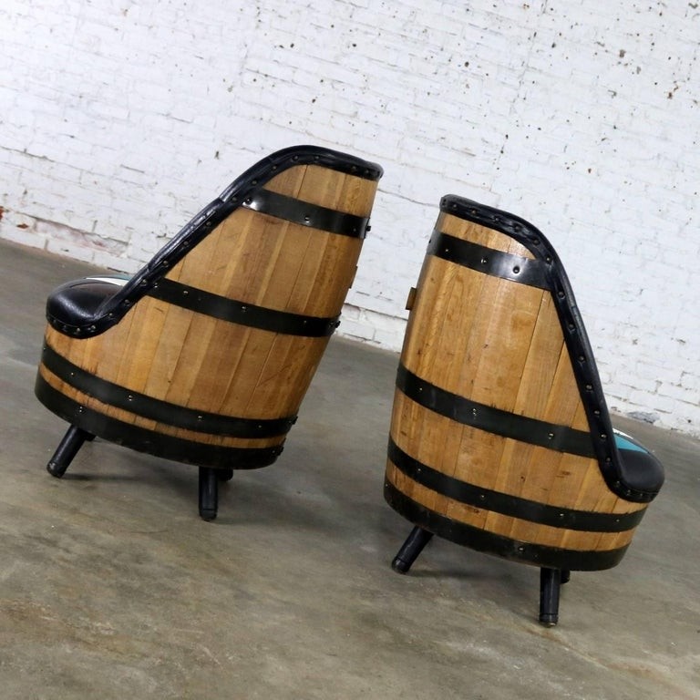 Midcentury whiskey barrel swivel barrel chairs by brothers