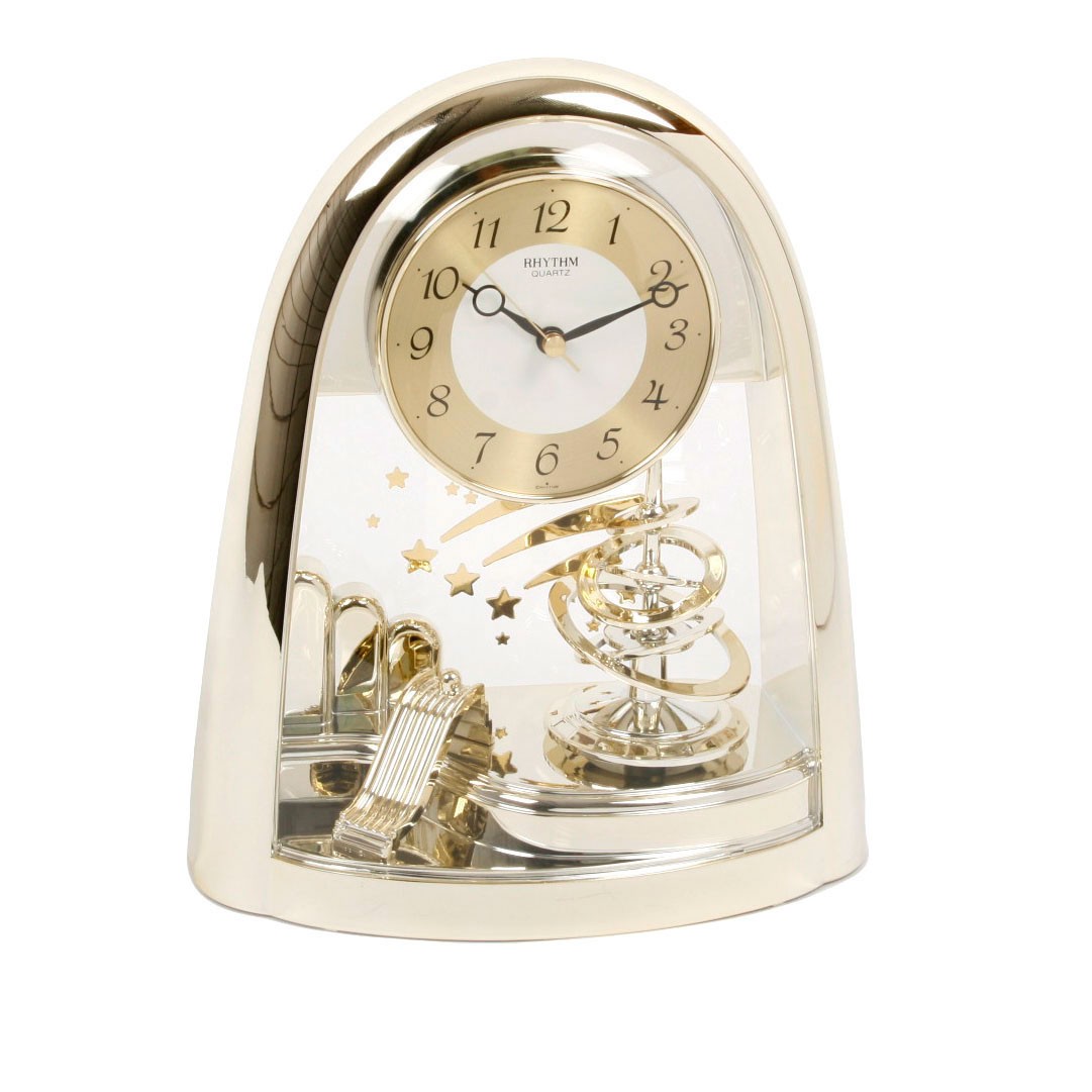 Rhythm contemporary motion mantel clock gold gilt spiral