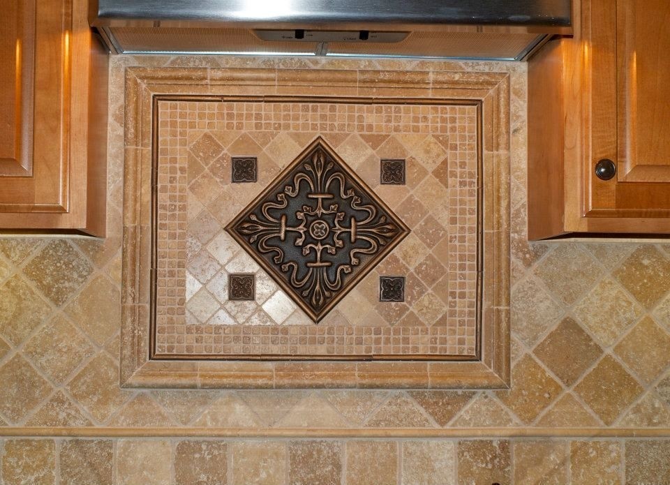 Travertine and bronze tile accent focal point bronze