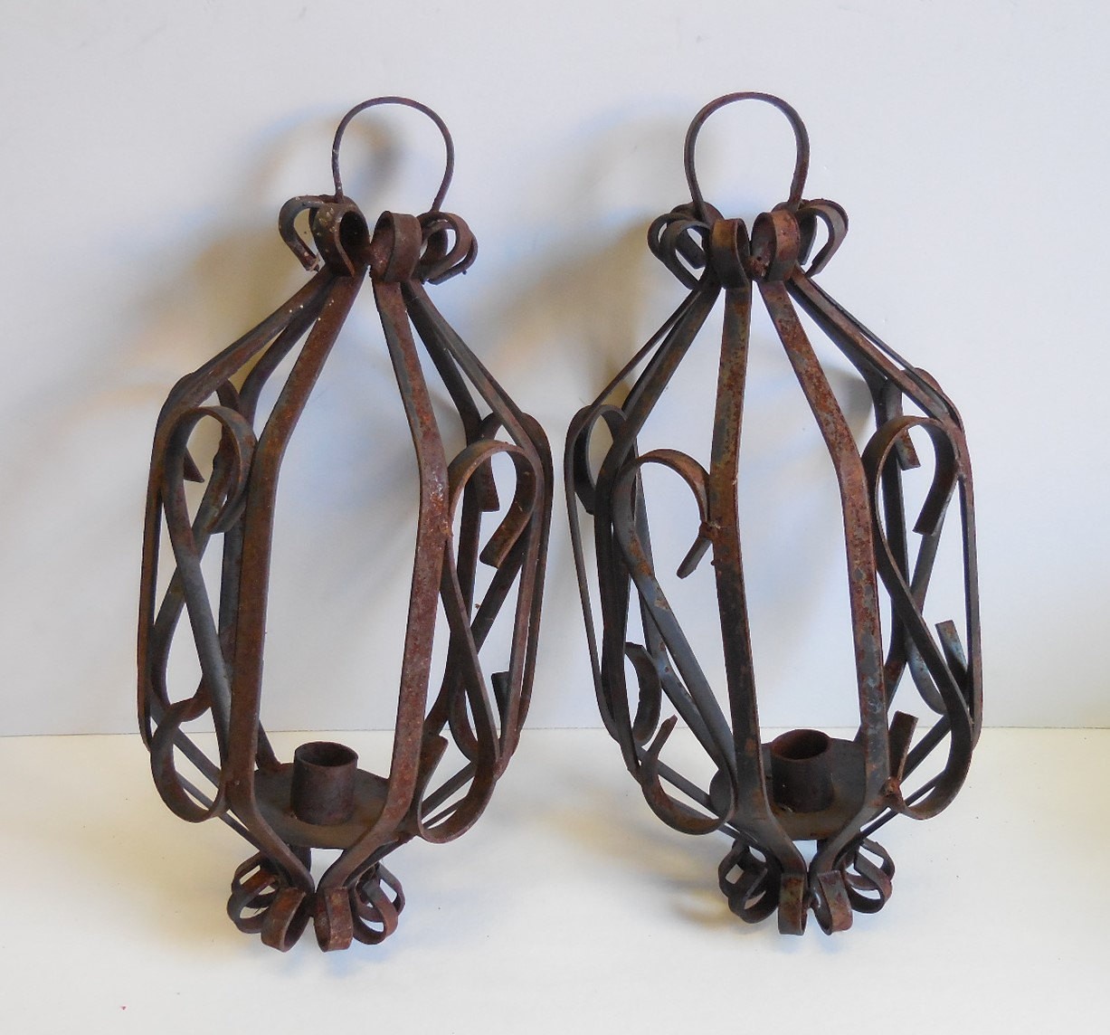 Two vintage hanging lanterns candle holders wrought iron