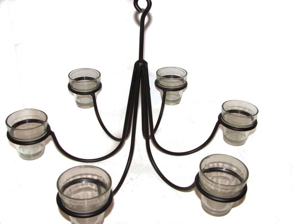 Wrought iron chandeliers and hanging candle holders 1