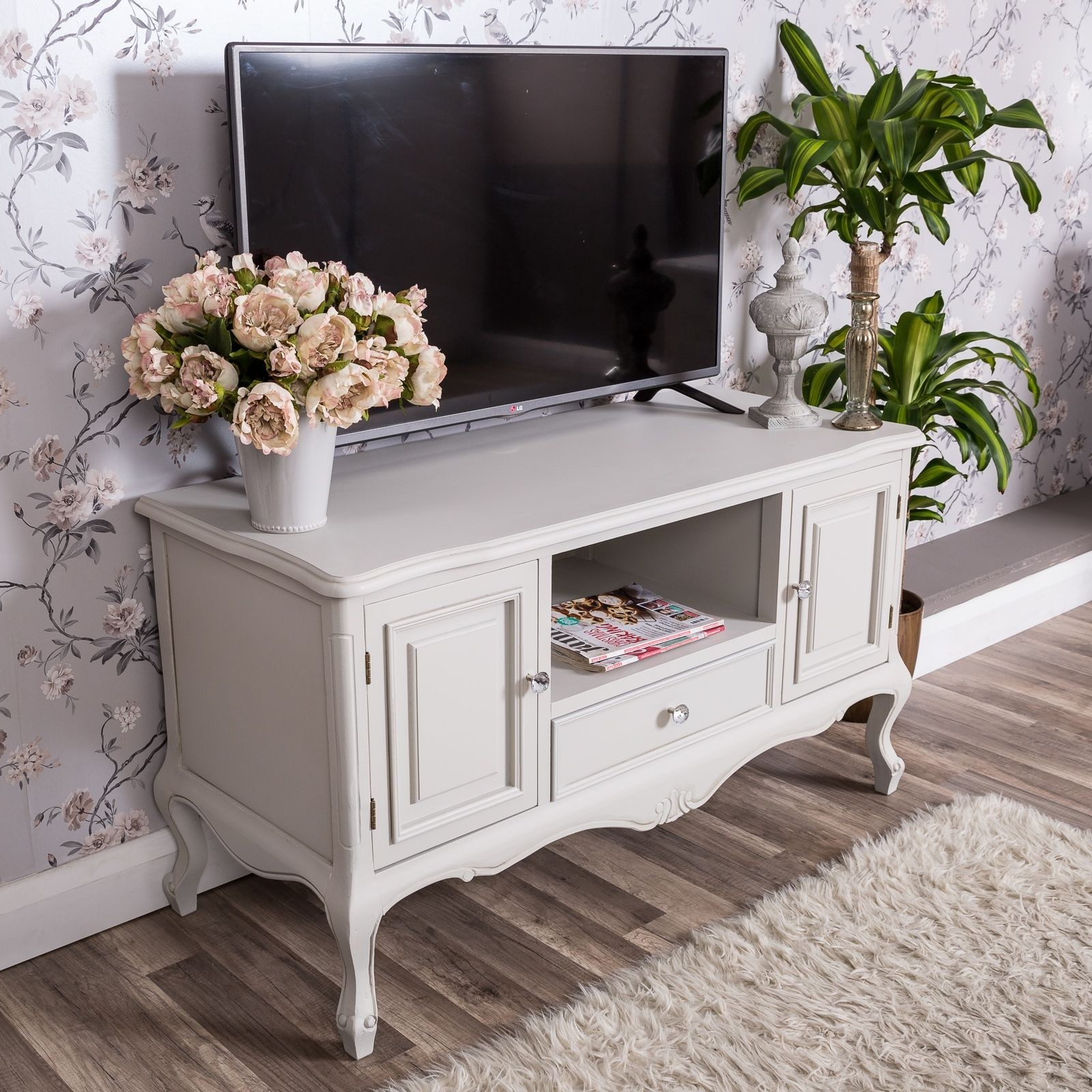 A stunning traditional style grey television stand with