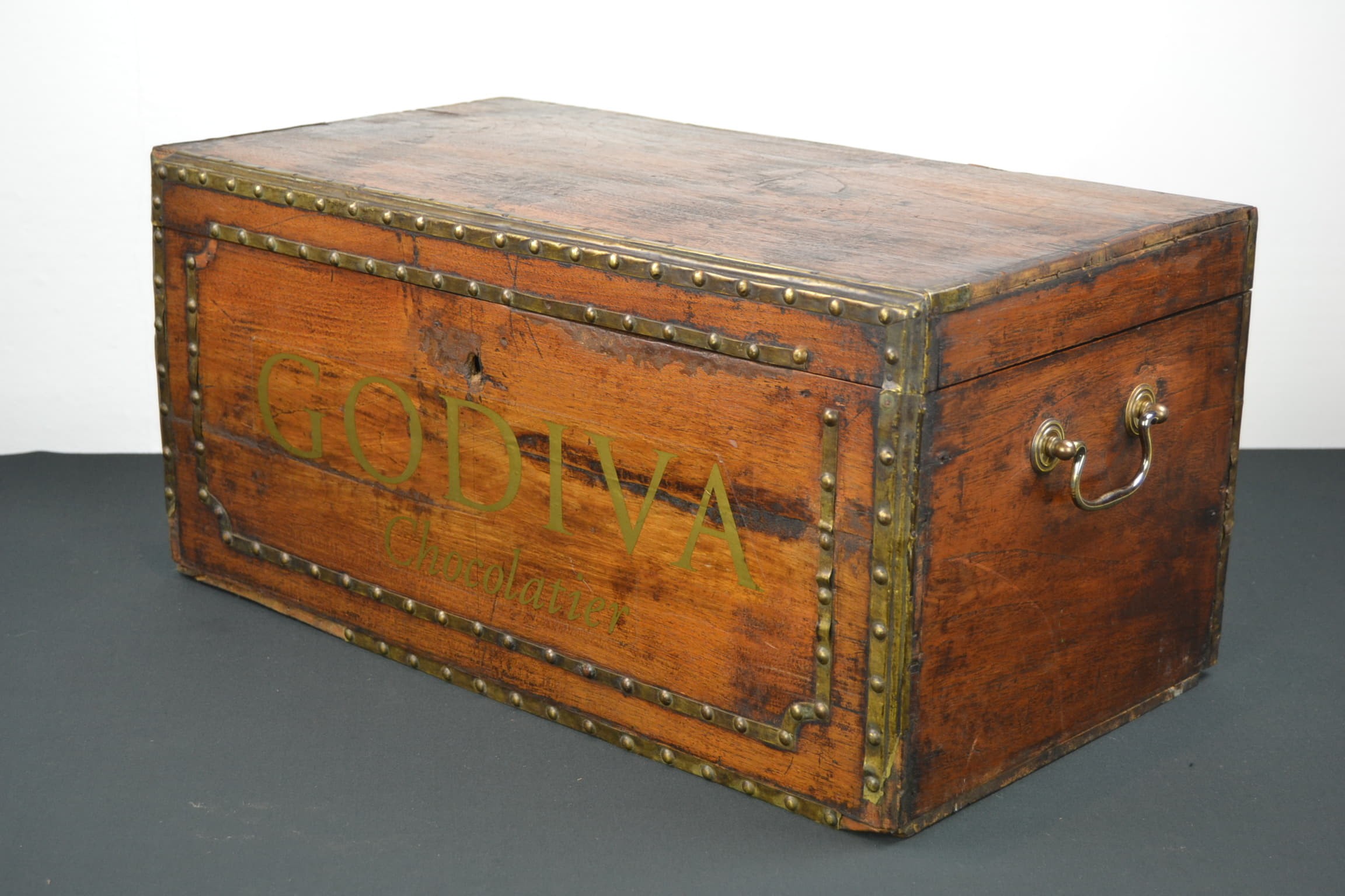 Antique wooden storage trunk with copper details retro