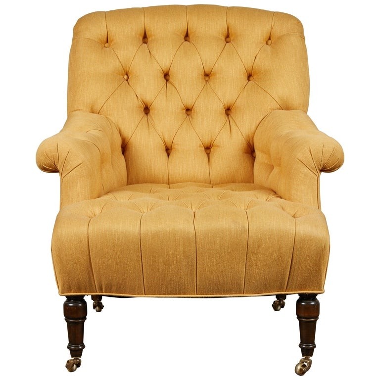 Classic english tufted club chair on casters for sale at