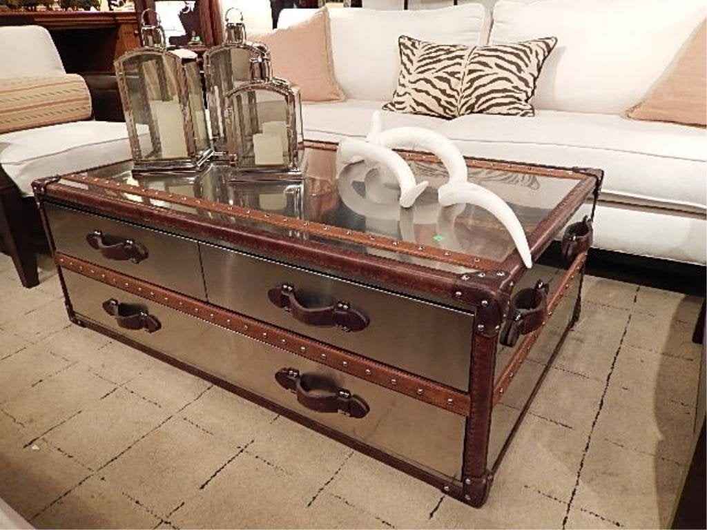 Polished metal clad steamer trunk style coffee table