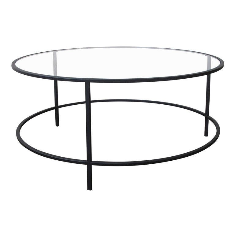 Steel and glass round coffee table at 1stdibs