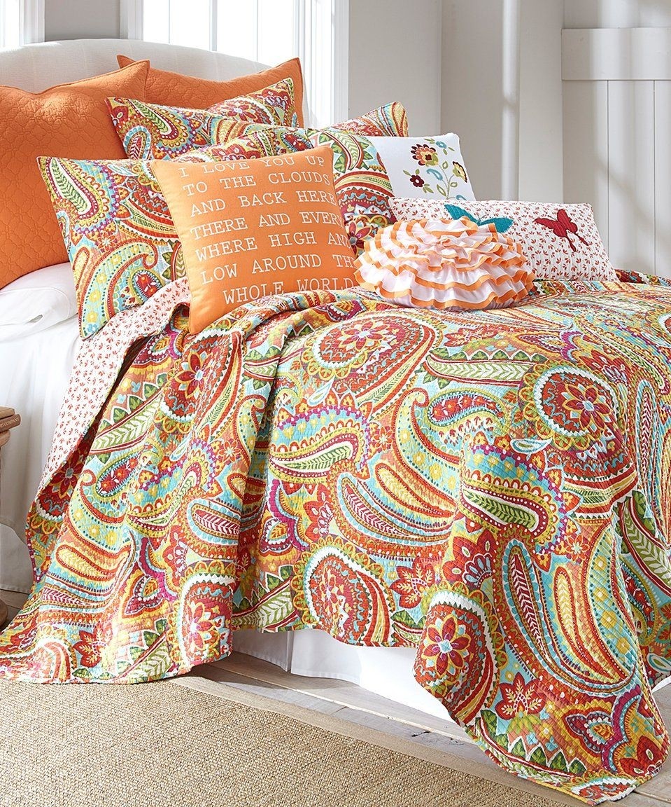 Take a look at this teal orange paisley quilt set