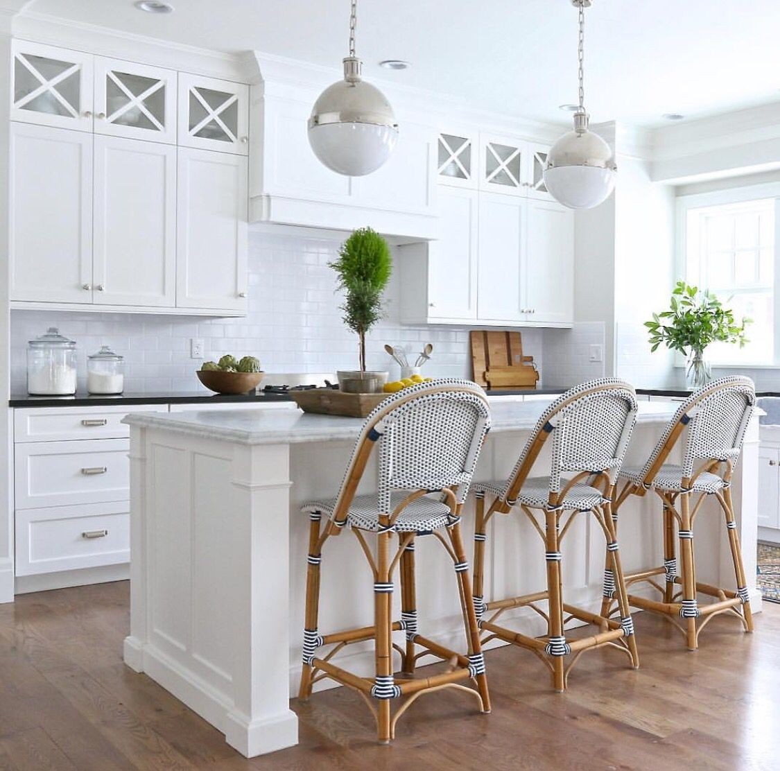 White kitchen with french bistro bar stools new house