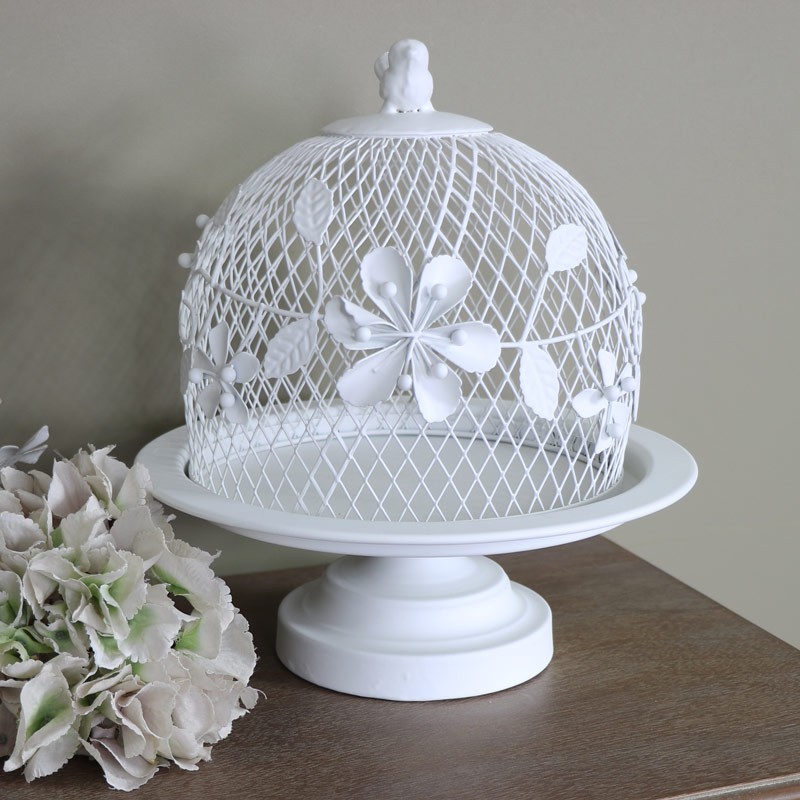 White metal vintage cake stand with wire dome cover
