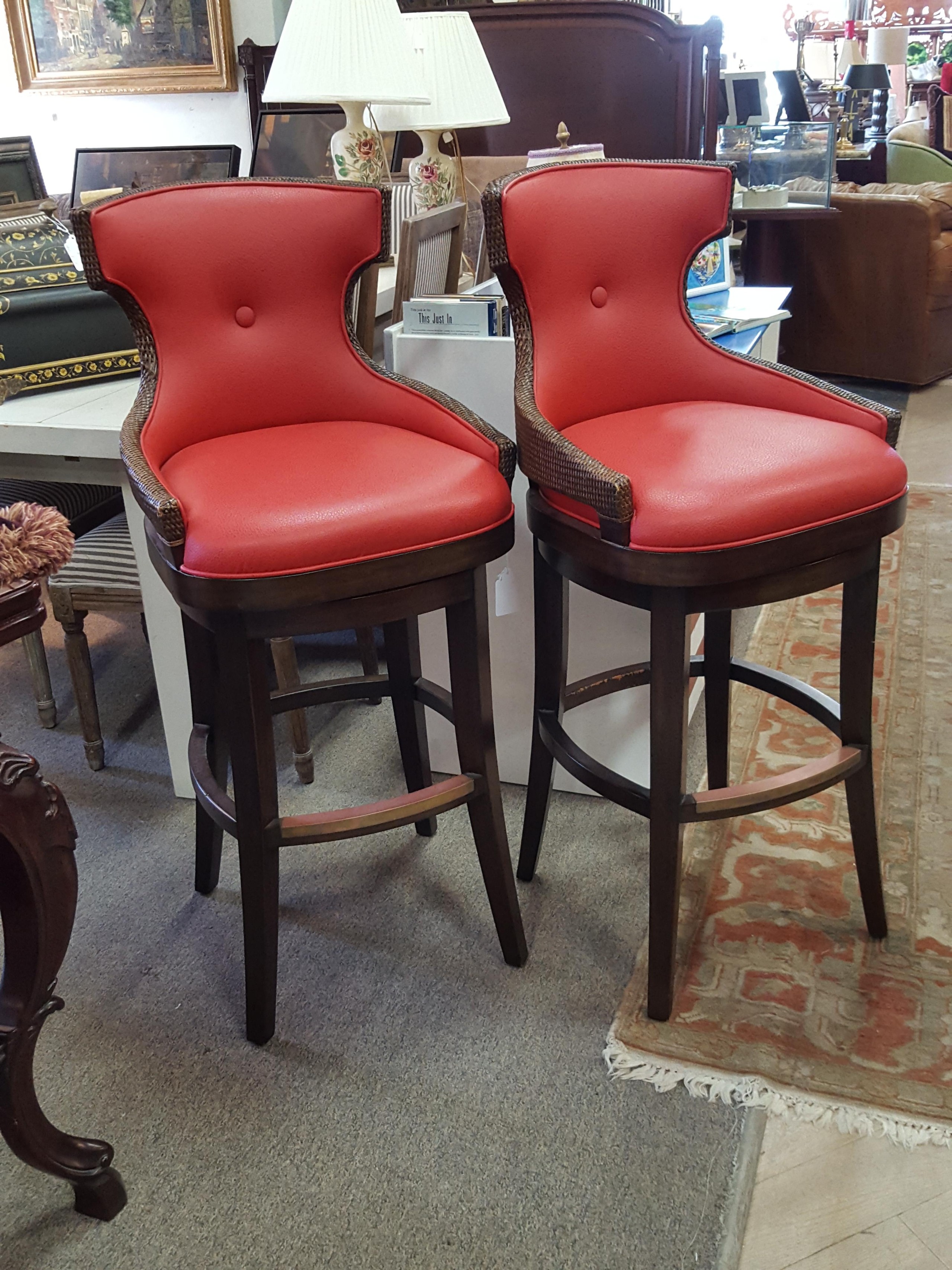 Beautiful pair of red leather swivel chairs benches