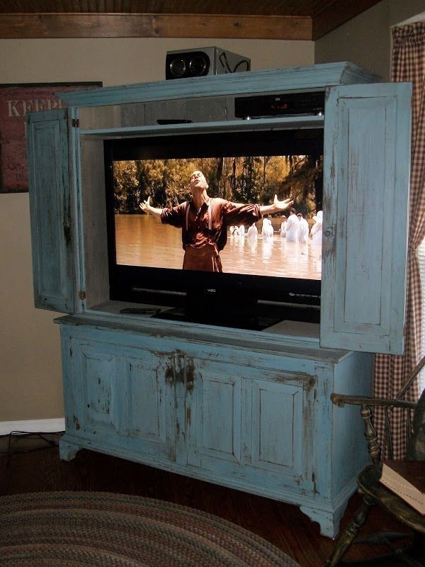 Flat screen tv armoire with pocket doors for your home