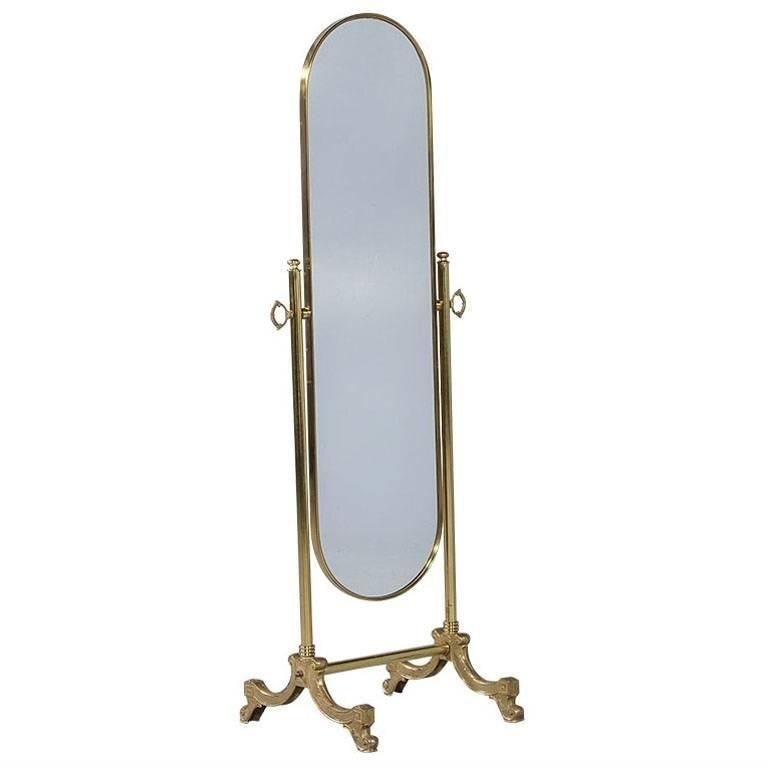 French oval cheval mirror with brass stand from a unique