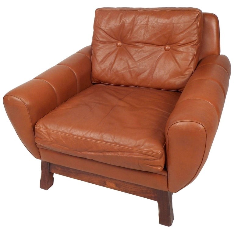 Mid century modern danish leather lounge chair for sale at