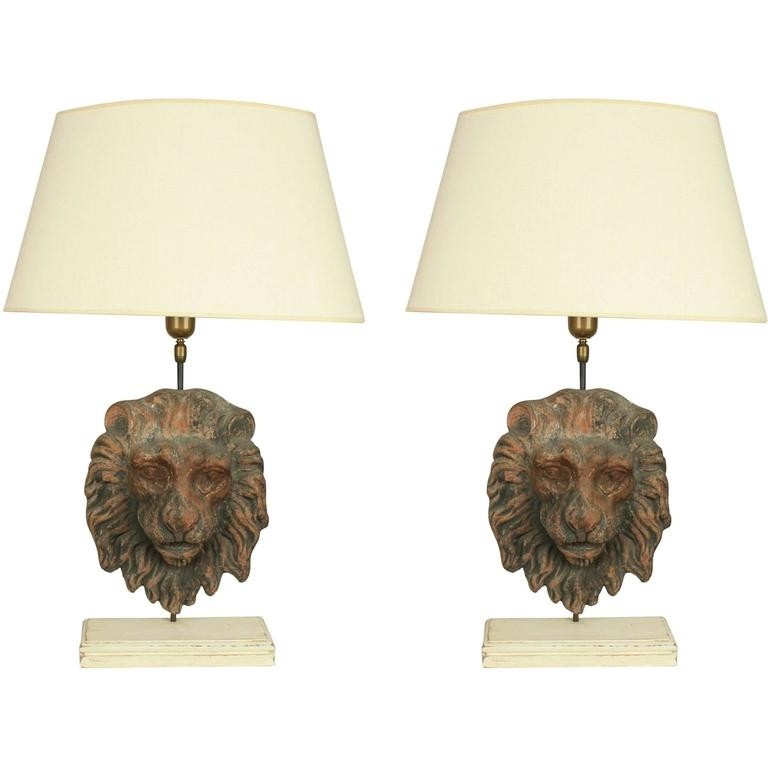 Pair of 18th century terracotta lions head table lamps