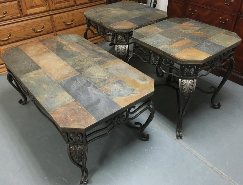 Slate top coffee tables with ornate iron legs