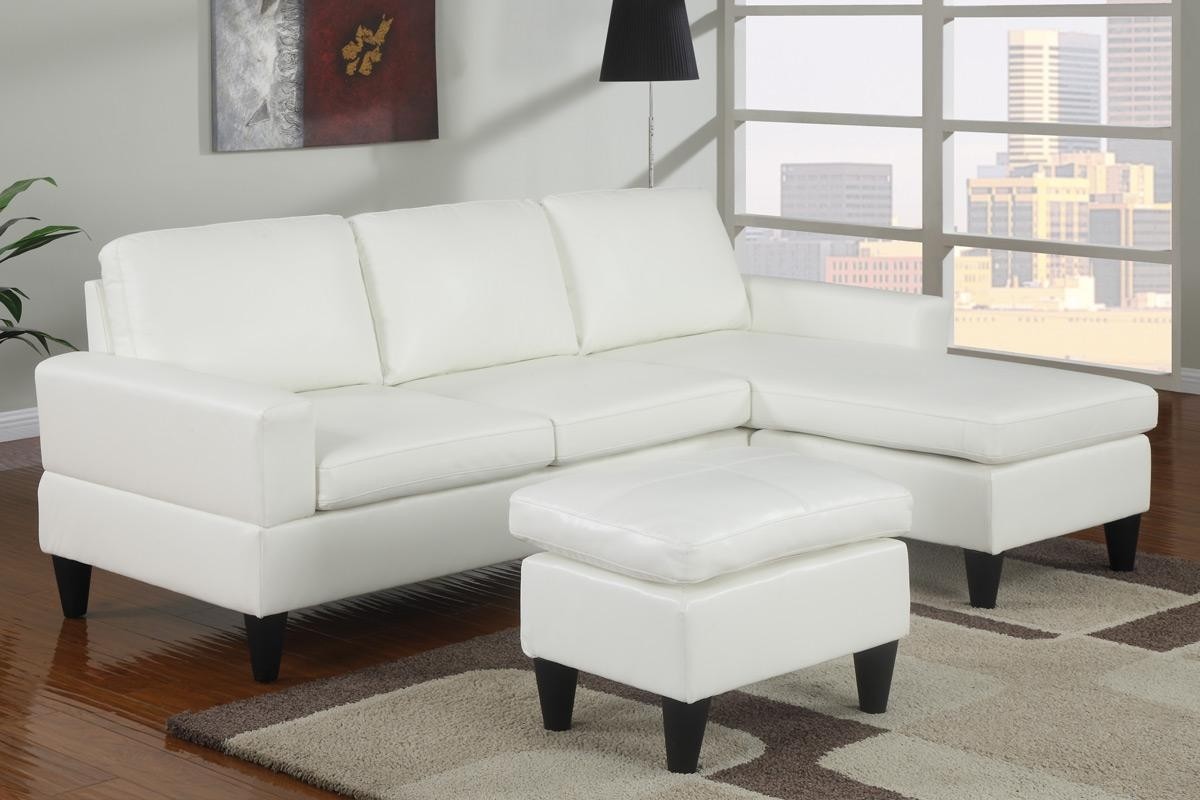 Small white faux leather sectional sofa with ottoman