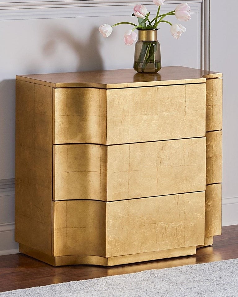 Vendome set of two wood nightstands finished in gold leaf