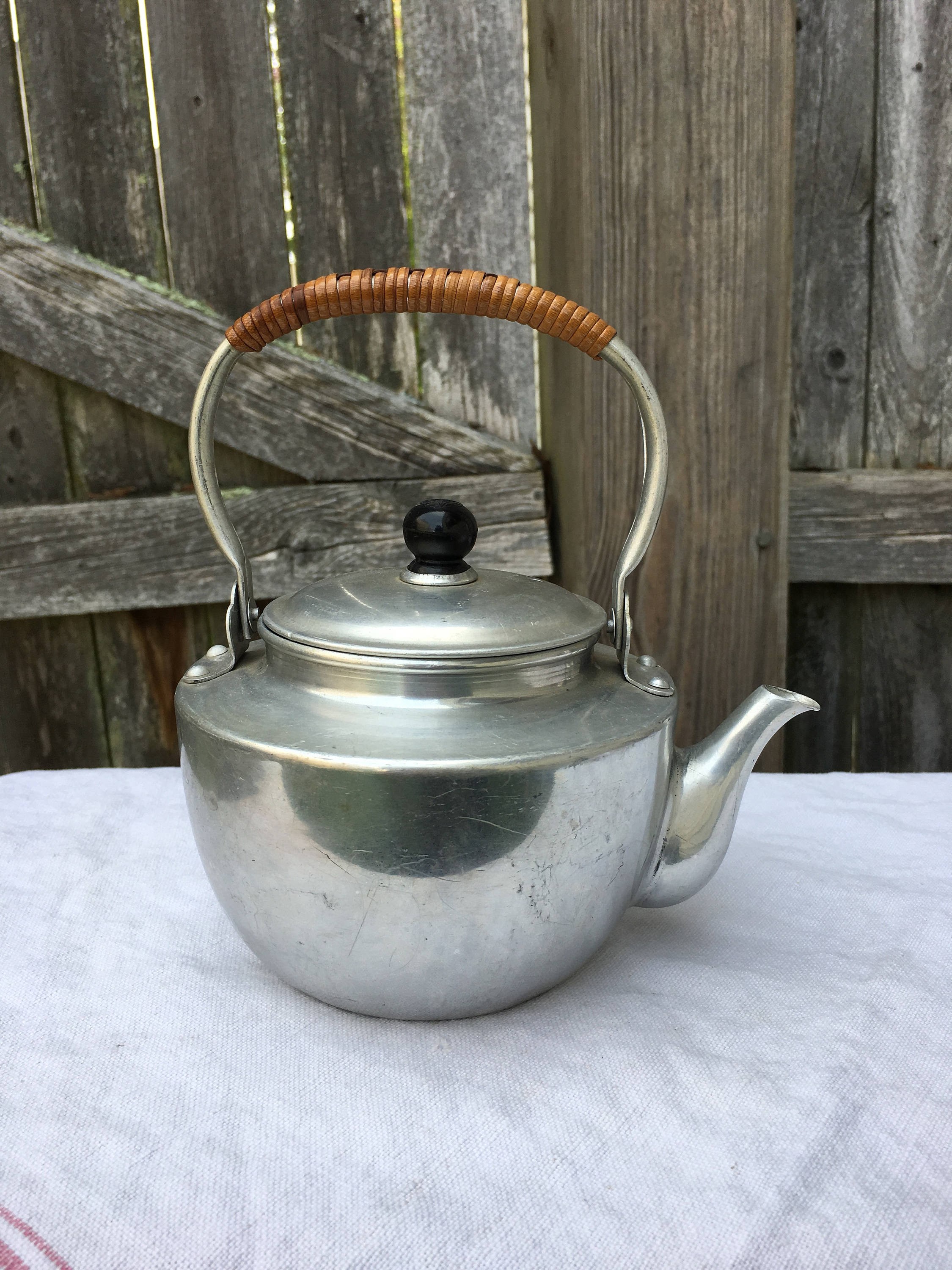 Vintage aluminum tea pot kettle with rattan handle hot cocoa