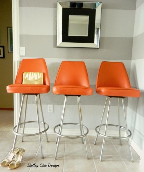 Vintage chrome orange vinyl bar stools by by