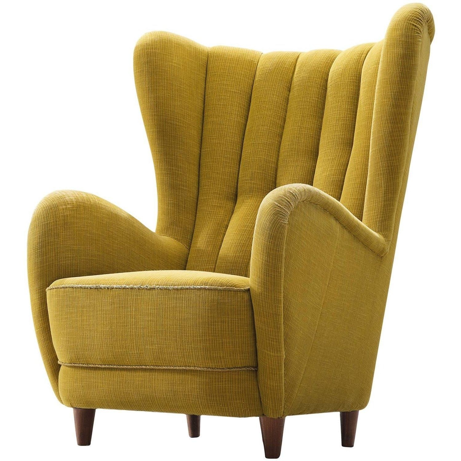 Danish wingback chair in original yellow upholstery