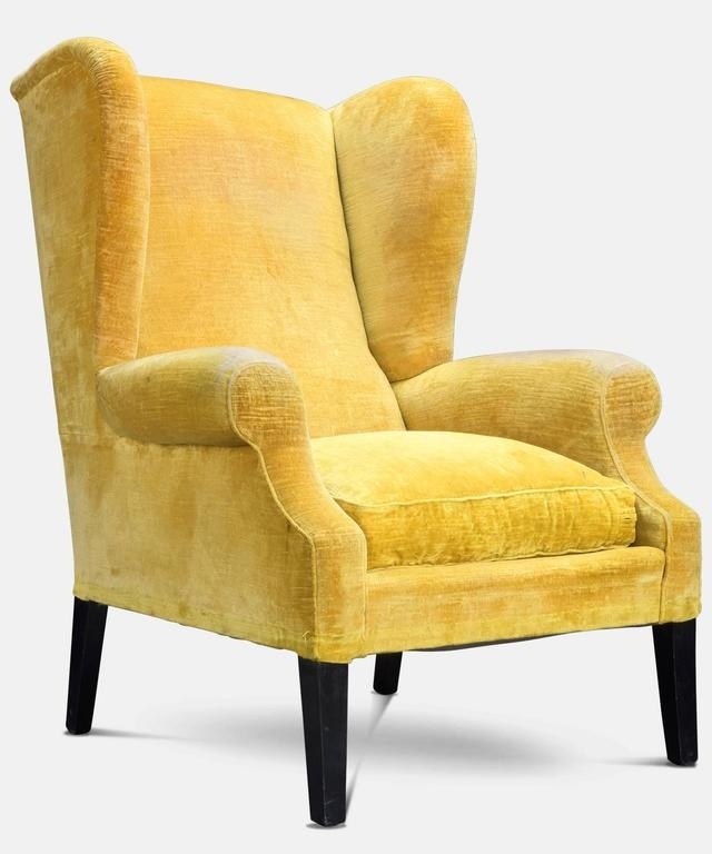 Pair of yellow velvet wingback armchairs circa 1950 at