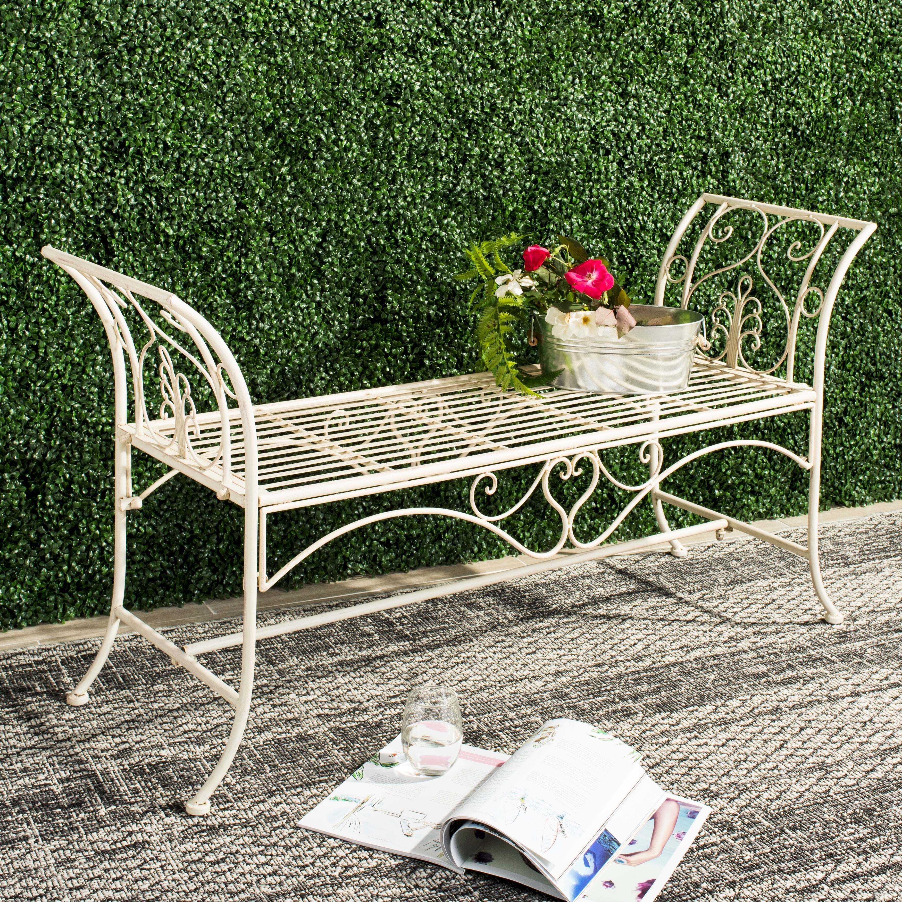 A chaise bench for garden antique wrought iron patio furniture