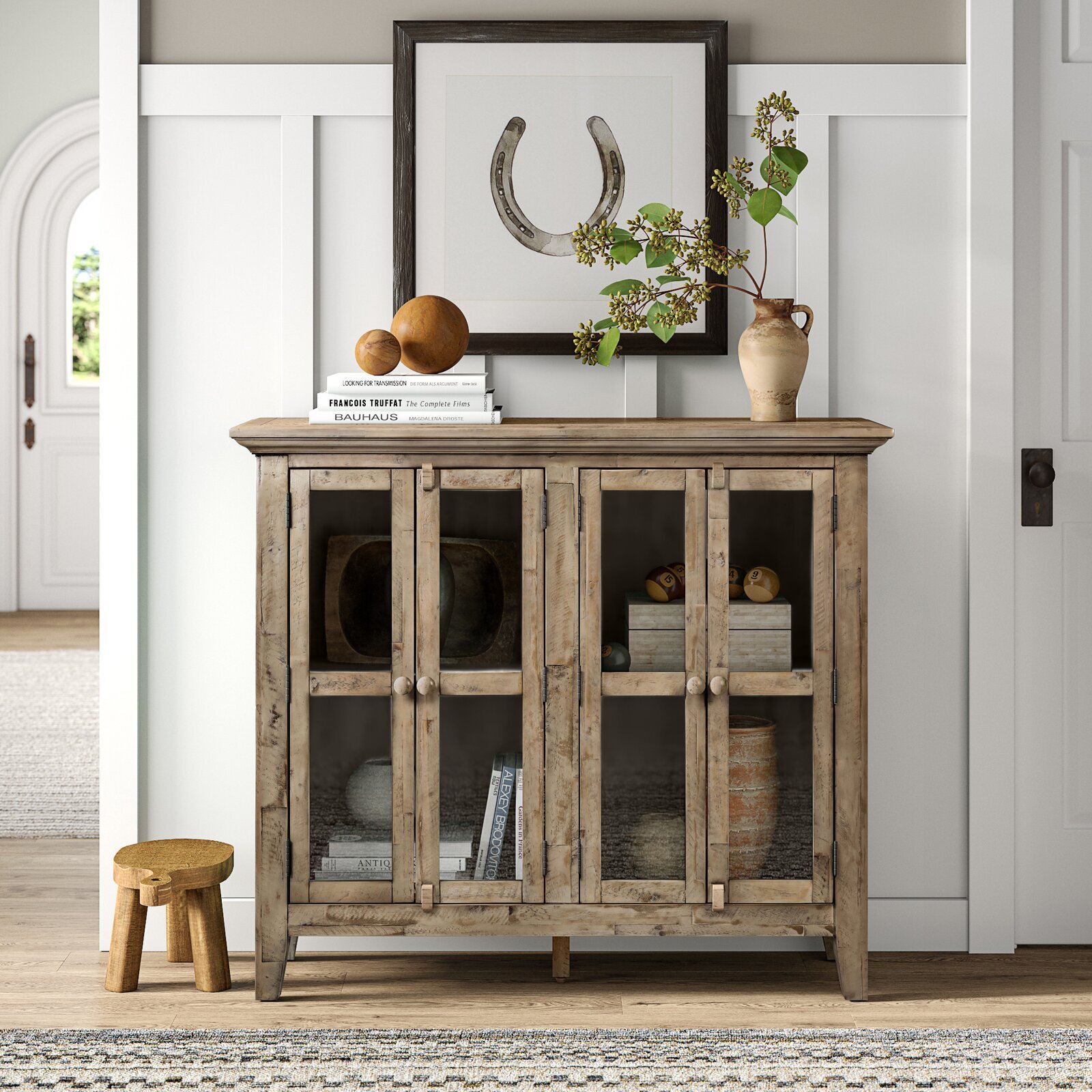 A farmhouse found wood cabinet with glass framed doors