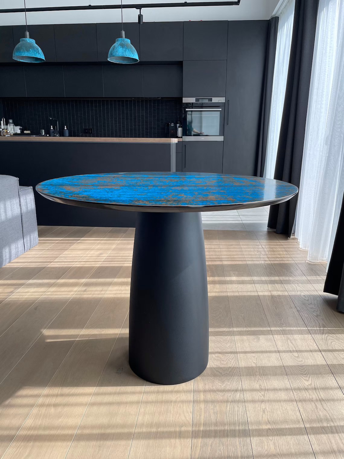 A glass table base that’s simple and streamlined