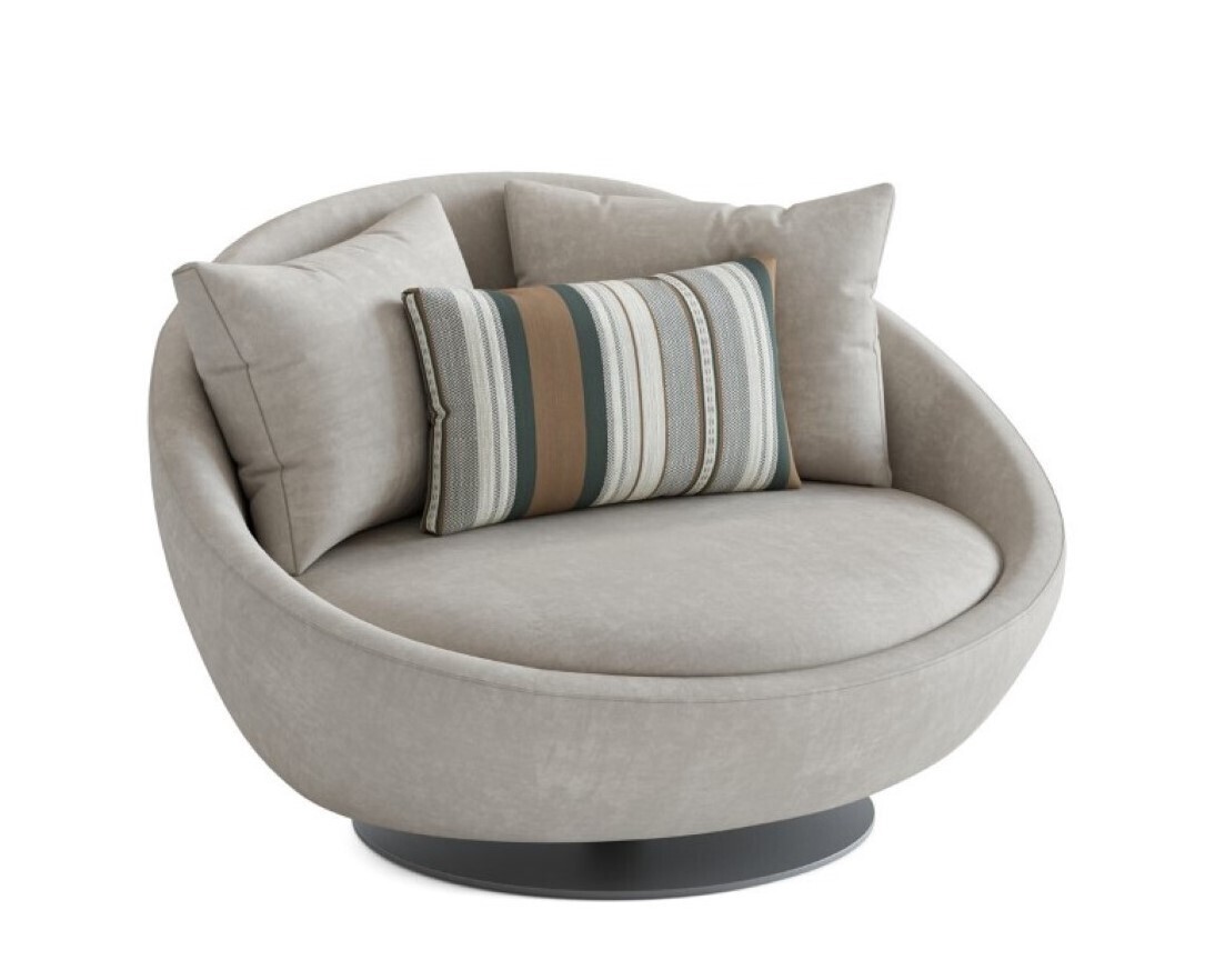 A pod shaped oversized round swivel chair