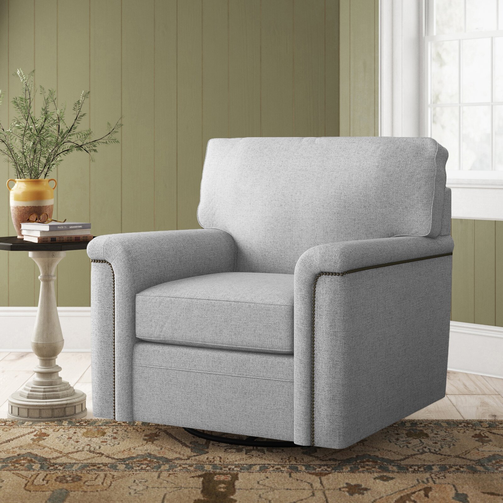 A round oversized chair with removable cushions