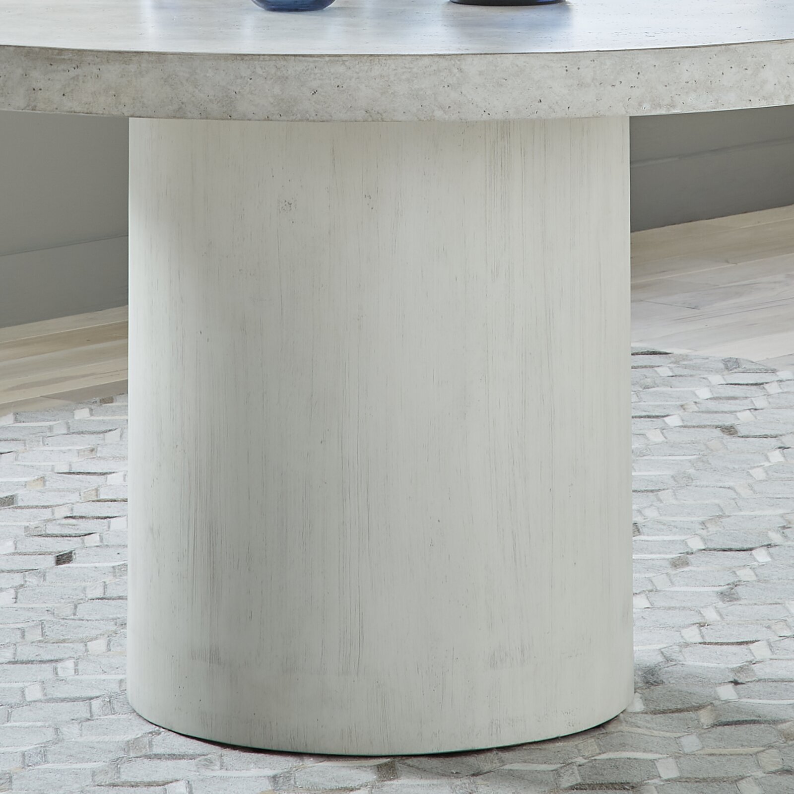 A strong white wooden pedestal table base for glass top