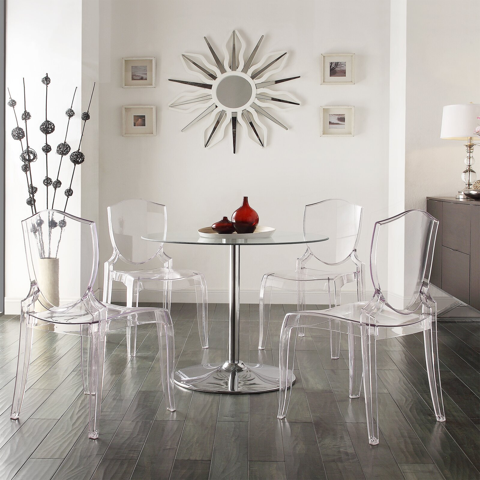 An eclectic style glass top dining table and chairs set 