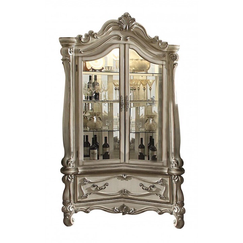 Antique curio cabinet in a lighter finish