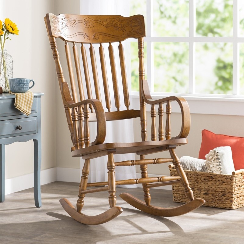 Antique wooden rocking chair with leather seat