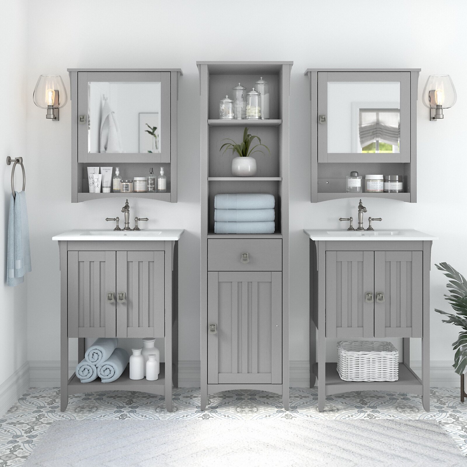 Bathroom vanity with matching linen cabinets