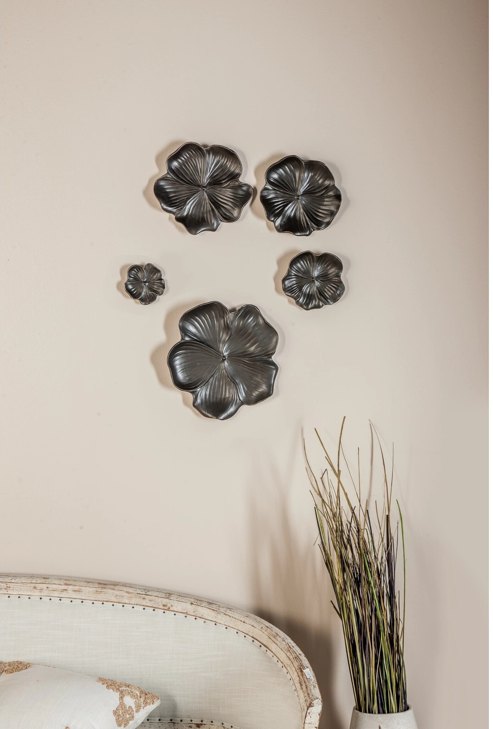 Cohesive set of ceramic flower wall decorations