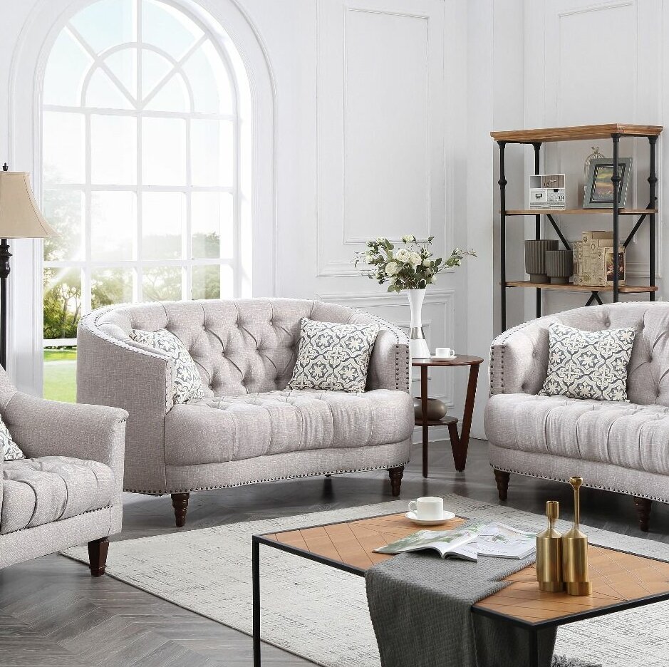 Complement a Curved Loveseat Couch With Round Furniture