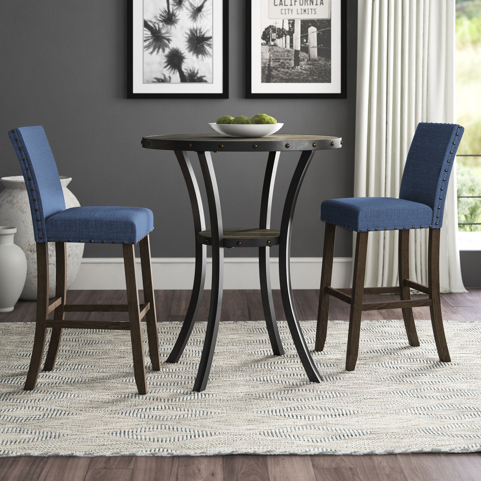 Four legged Tall Round Table with Armless Full back Upholstered Chairs