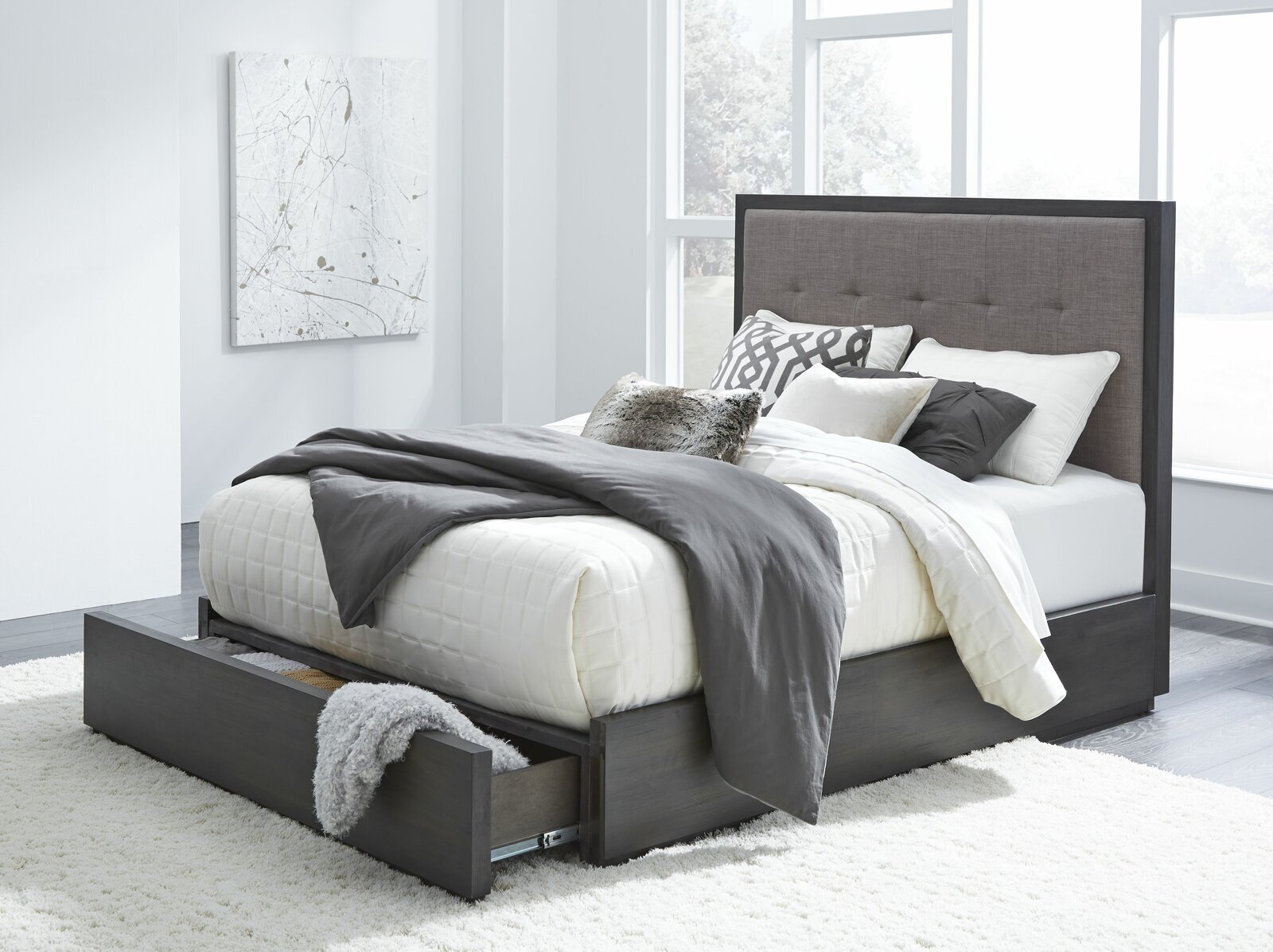 Full size platform storage bed with a tall headboard