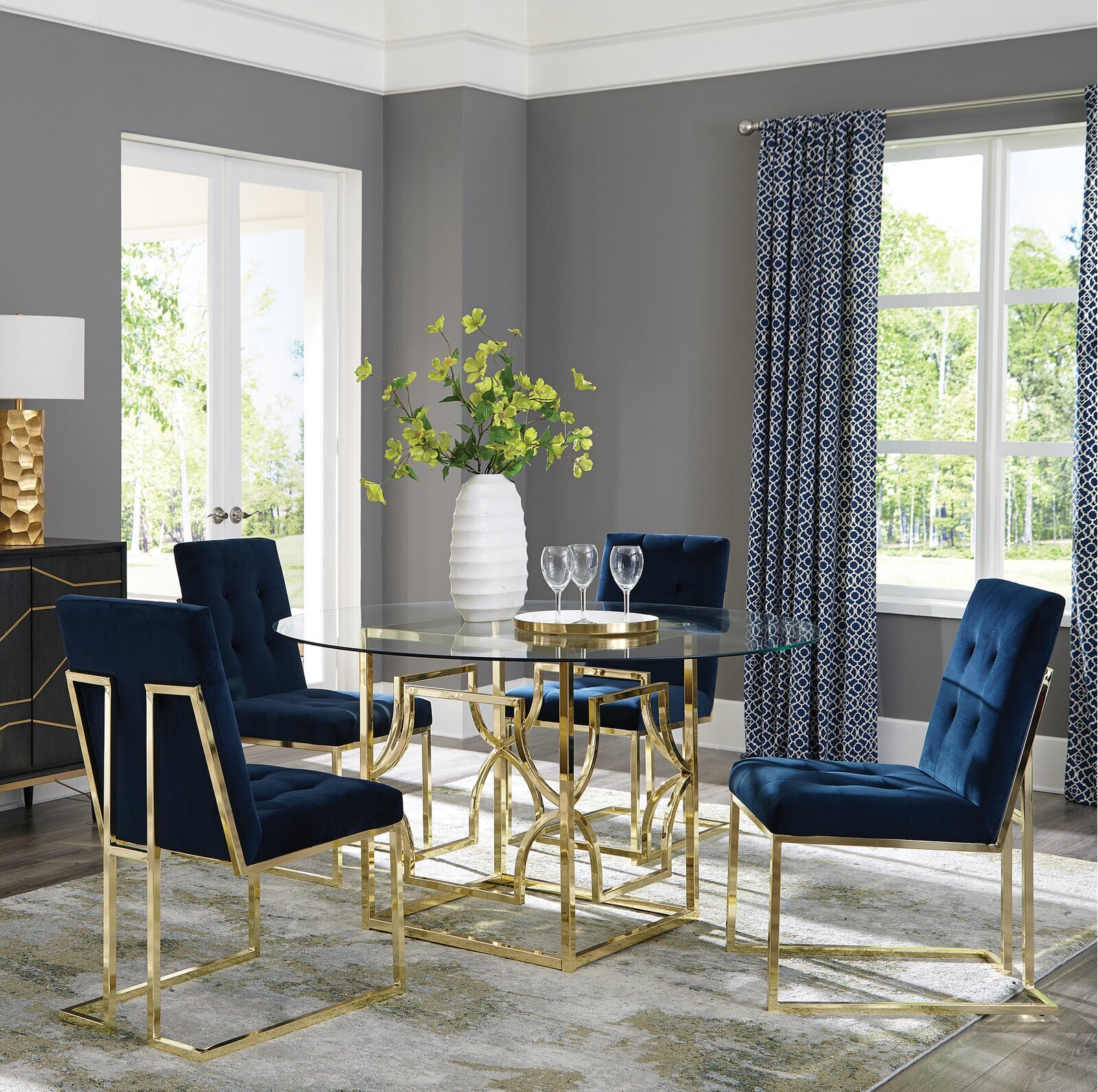 Luxurious glass dining table ensemble with gold details