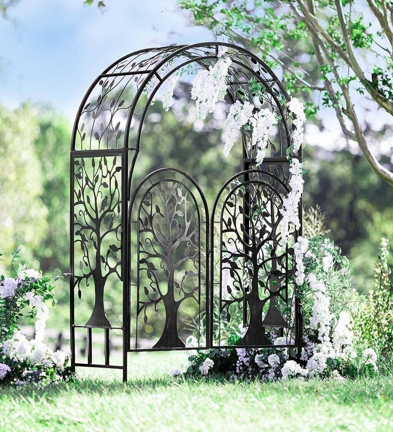 Metal garden arbor with gate