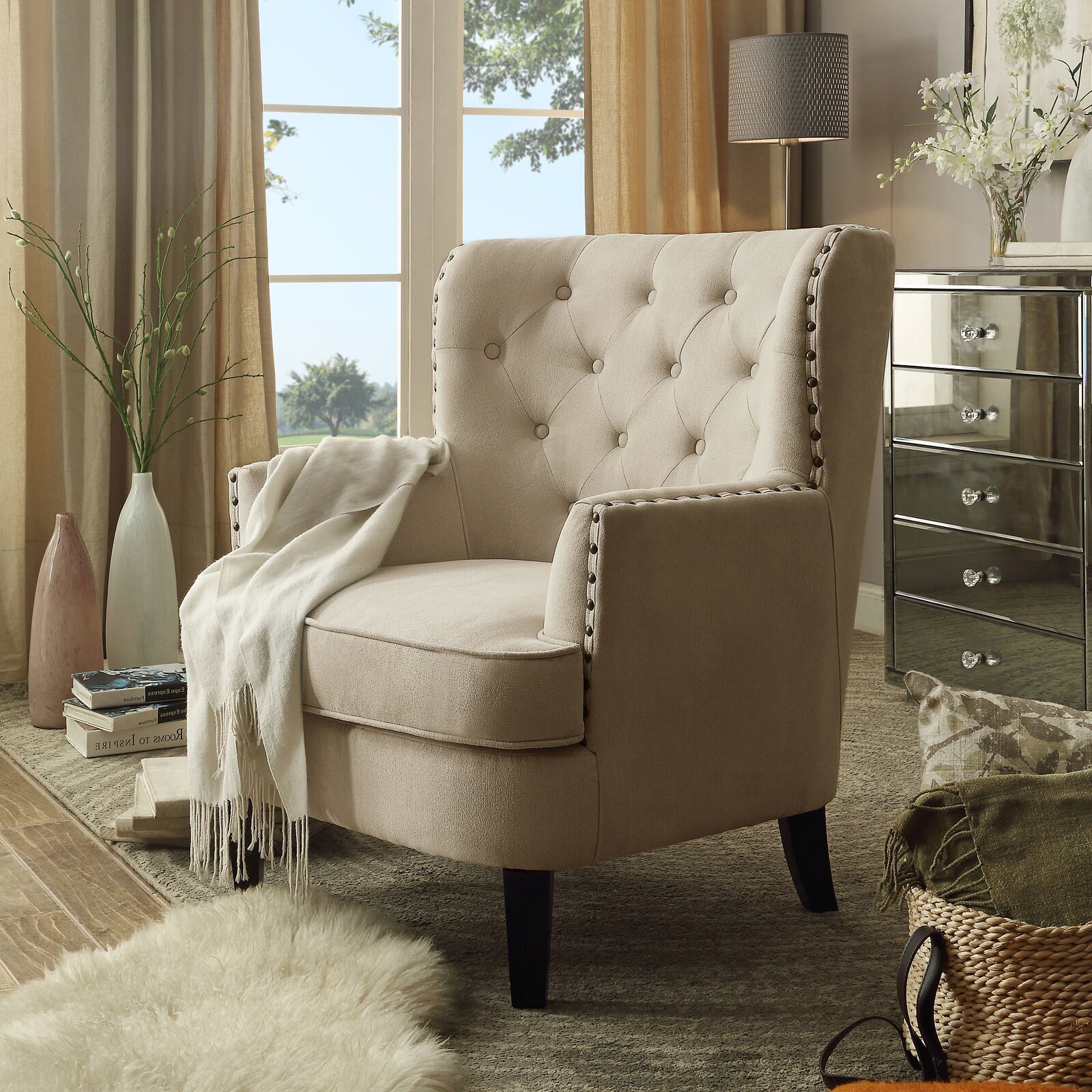 Oversized wingback chair with traditional upholstery accents 