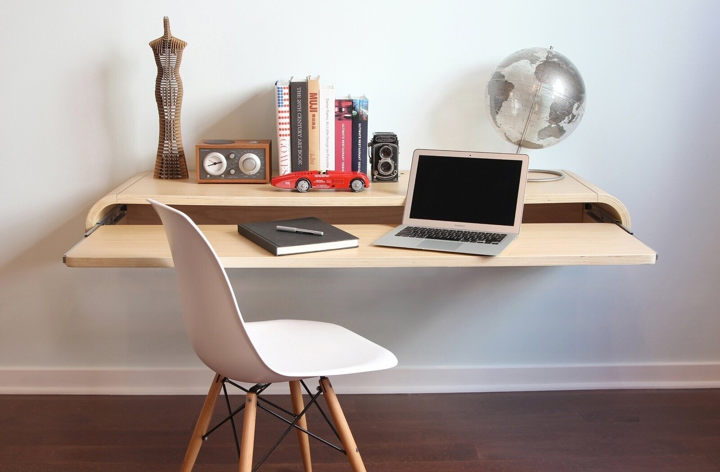 Floating computer desk with store keyboard tray