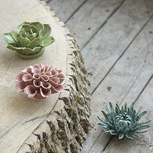 Set of three different ceramic flower wall decorations