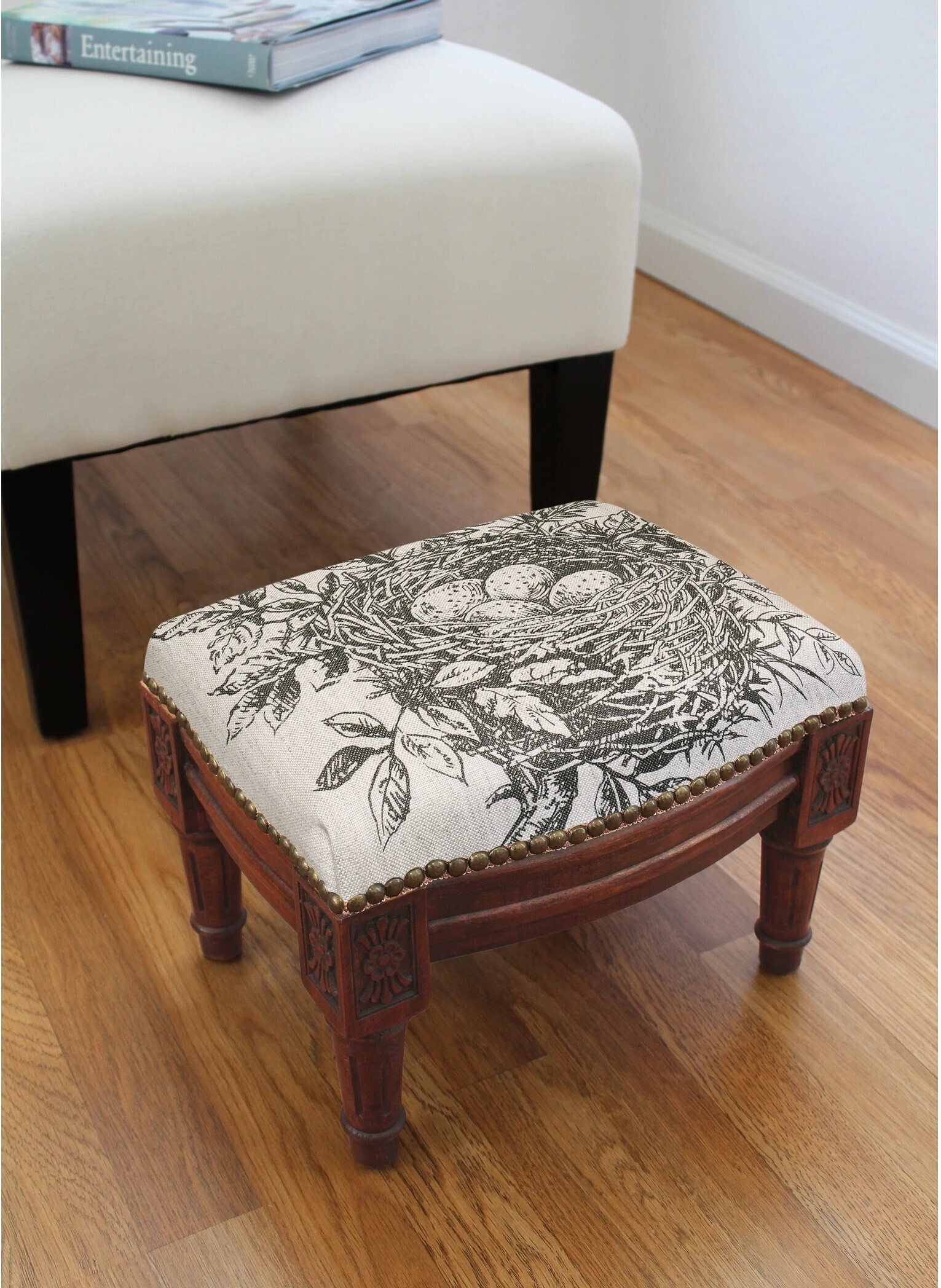 Small footstools with a relevant print